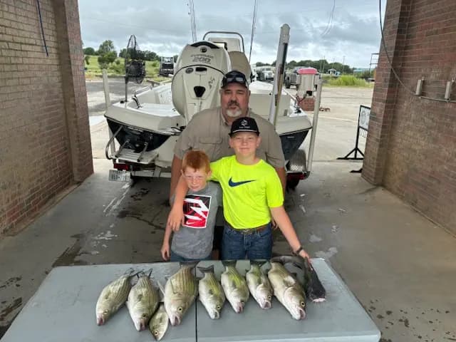 Anglers with a table of sand bass after a Lake Bridgeport trip